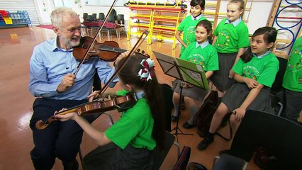 Child tells off Jeremy Corbyn for bad violin playing