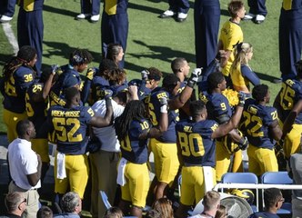 DISTURBING Twitter Comments on the Michigan football players national anthem protest