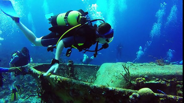 Young divers explore historical wreck in Bay of Pigs