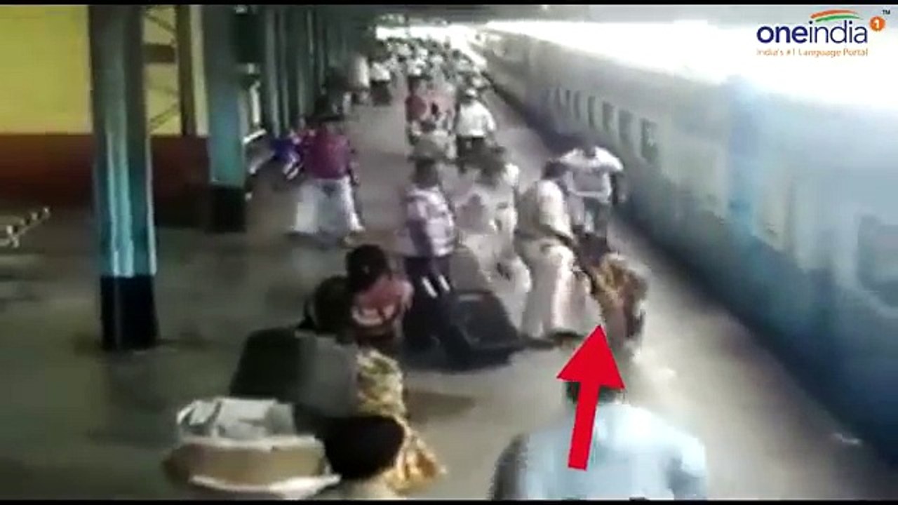 Maharashtra_cop_saves_woman_from_fatal_accident_at_railway_station,_Watch_Video