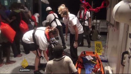 Reporting onboard ship rescuing refugees in Mediterranean