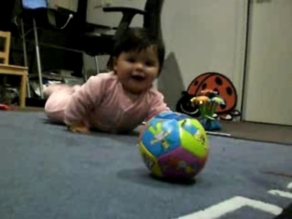 Alma Playing with a ball