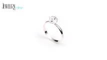 Jewellery - Silver ring with protrudent clear heart zircon