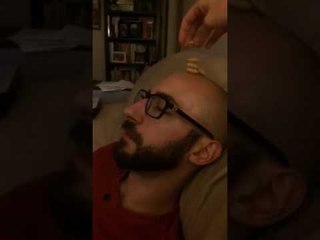 Woman Stacks Treats on Sleeping Boyfriend's Head