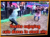 Youths enjoying rain dance in steel city