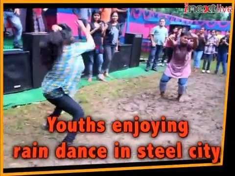 Youths enjoying rain dance in steel city