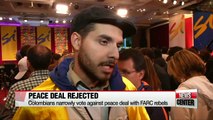 Colombians narrowly vote against peace deal with FARC rebels