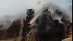 Indian Army burning crops and firing teargas shells at villagers in Kashmir