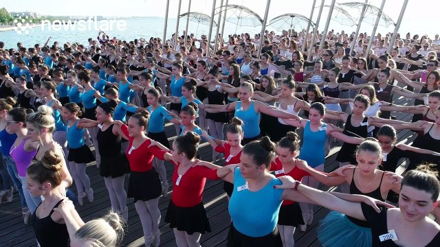 More than 400 ballerinas break world record for largest stand 'en pointe'