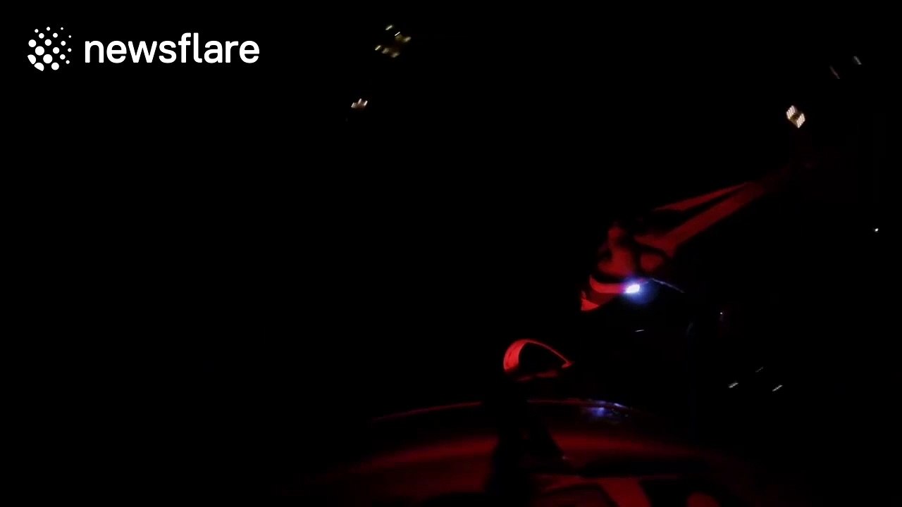Paratrooper skydives at night
