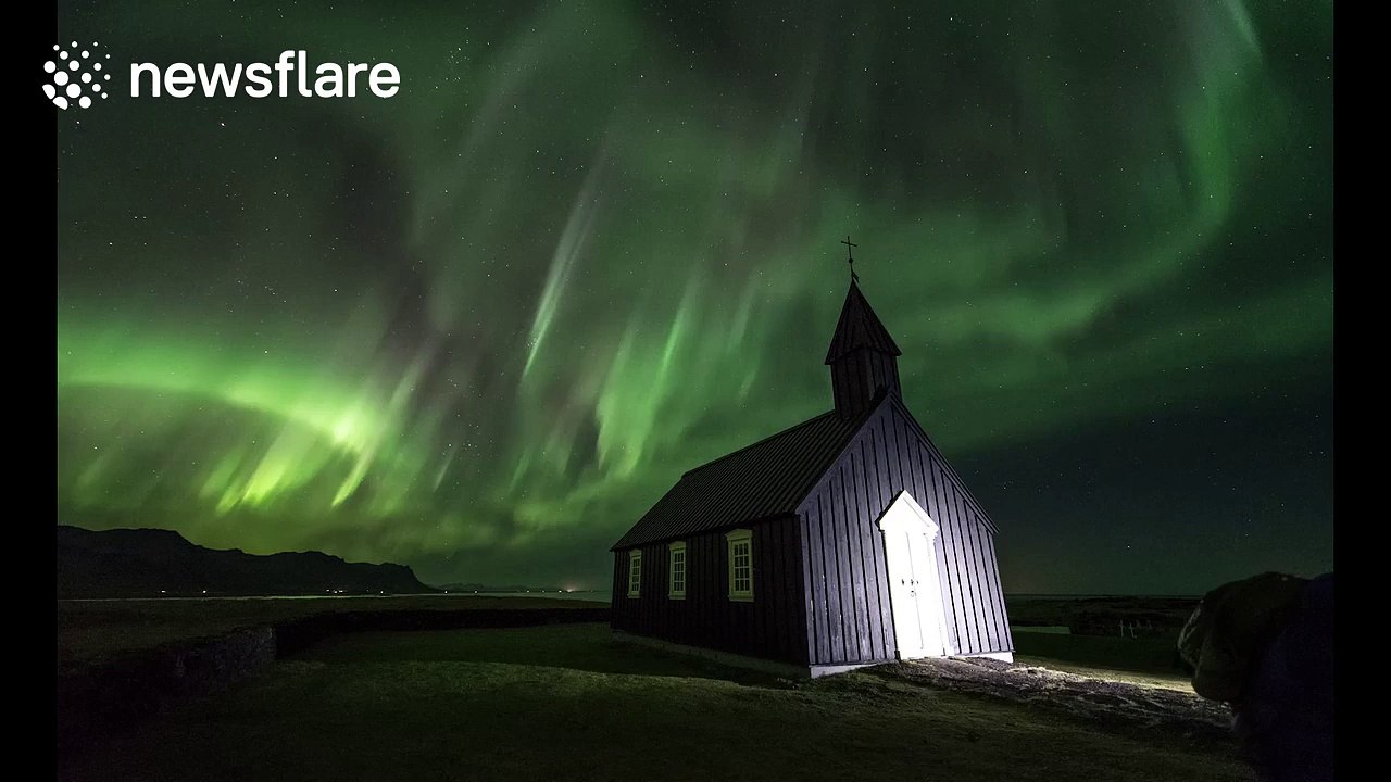 Beautiful Northern Lights display over Iceland church