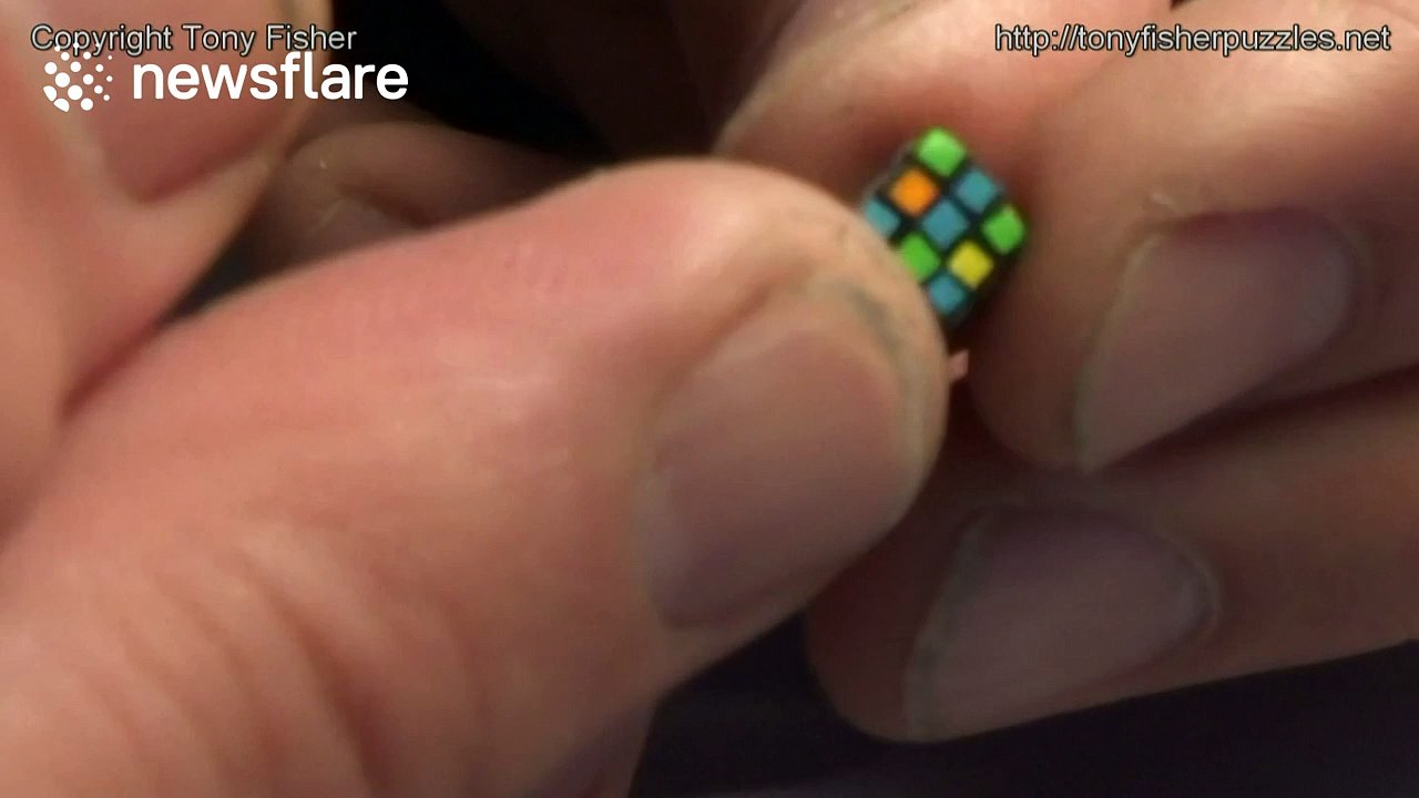 Man solves 'world's smallest Rubik's Cube'