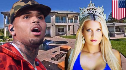 Chris Brown appuie son arme à feu contre la tête d'un mannequin