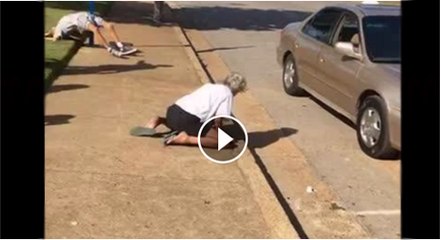 Beggar woman at footpath of Dubai