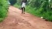 A man was walking on his way and suddenly a snake jumped over him