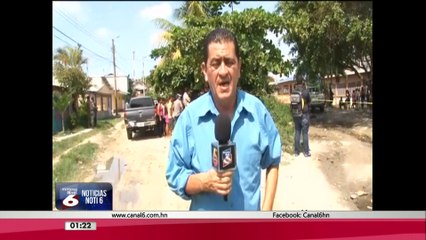 Ultiman a dos personas frente a cancha de futbol en Choloma