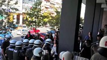 Violent clashes between protesters and police outside Greek courthouse