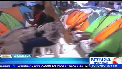 Tải video: Crisis de migrantes: más de 8.000 haitianos están varados en Tijuana a la espera de respuesta sobre su paso a EE.UU.