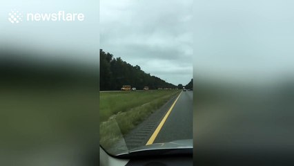 School buses filmed heading into Charleston to help with Hurricane Matthew evacuation
