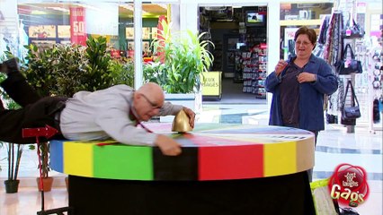 Tie Gets Caught in Wheel of Fortune