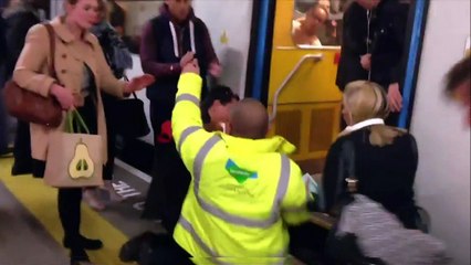 Dramatic moment dog is rescued from train tracks