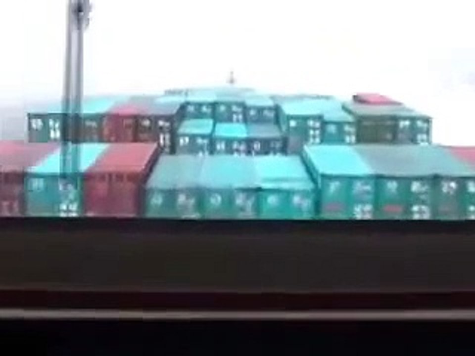 Cargo Ship in Rough Seas Losing Cargo