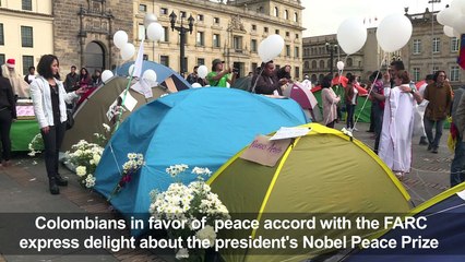 In Bogota, demonstrators for peace celebrate Nobel Prize