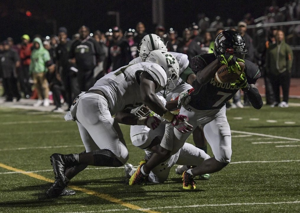 H.D. Woodson survives barn burner against Wilson, 41-35
