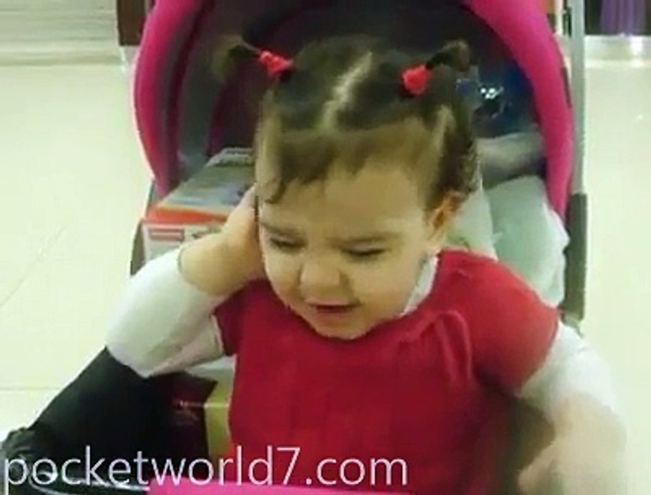 little baby talking over the phone