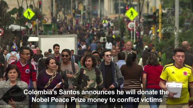 Santos to donate Nobel prize money to Colombia conflict victims