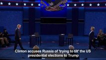 Clinton says Russia seeking to tilt election to Trump