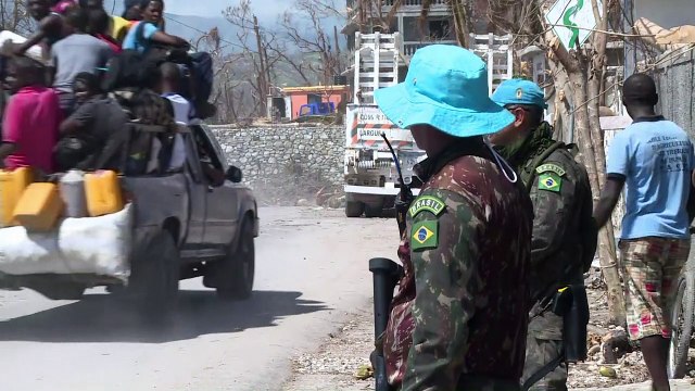 Haitians rebuild as aid effort gains traction