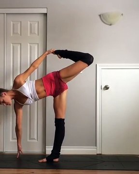 Gymnastic exercises. Girl gimnast . Girl doing splits