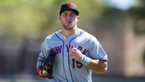 Tim Tebow tends to fan having a seizure