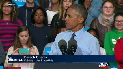 Obama sent sa main pour démentir les rumeurs de "démons"