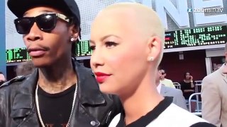 Topless Amber Rose not yet over Wiz Kalifa,  takes a steamy shower