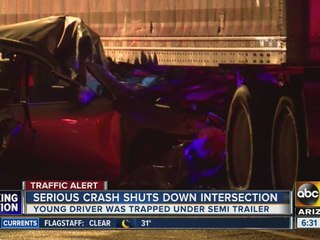 Driver, 21, hurt in crash with semi truck in north Phoenix