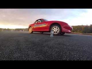 Teenager's Bottle Flip Stunt Drive Combo