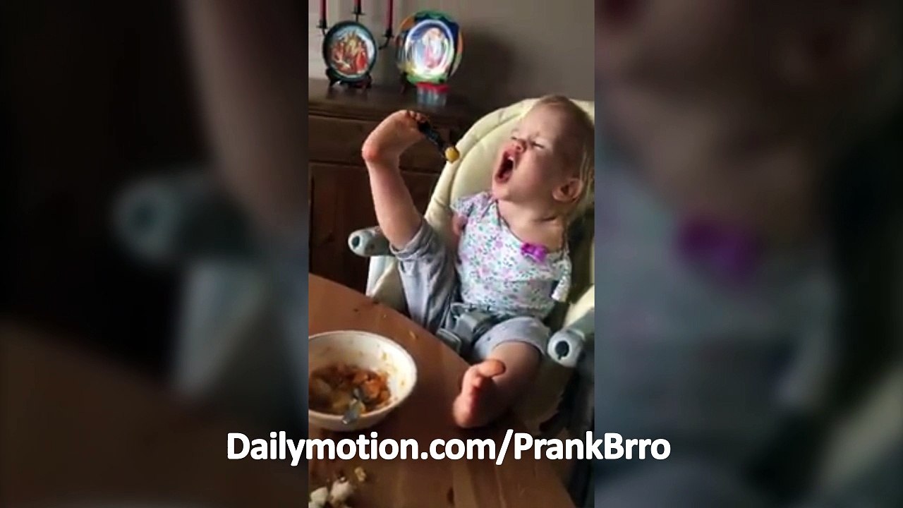 Baby eats using legs
