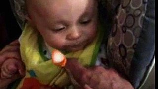 Baby Eating Cereal For The Very First Time