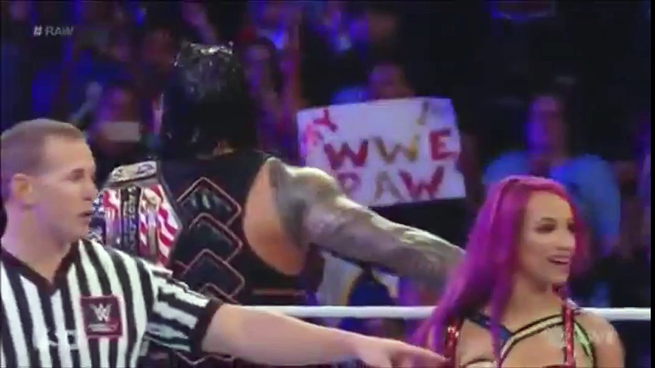 ROMAN REIGN AND SASHA BANK VS CHARLOTTE AND RUSEV
