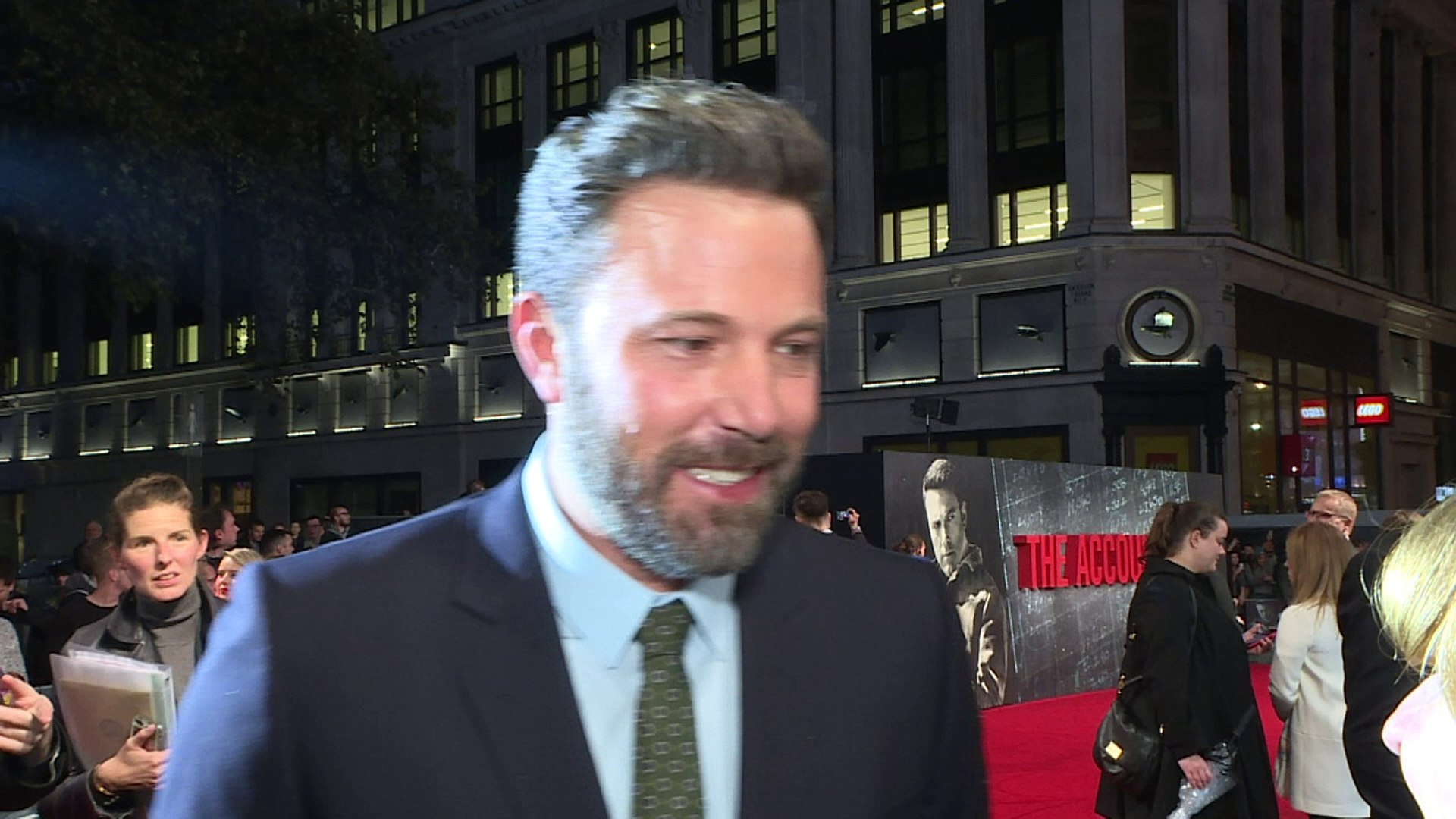 ⁣Ben Affleck wears his Batman leathers at home!