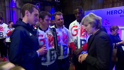 Theresa May mingles with Olympic and Paralympic stars