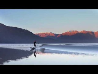 Surfer Rides Alaska's Turnagain Arm Bore Tide