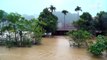 Destruição e morte em inundações no Vietnã