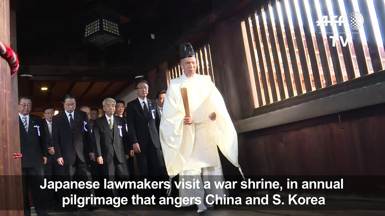 Dozens of Japan lawmakers visit controversial war shrine