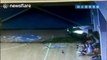 BMW crashes through stadium wall, narrowly missing basketball player