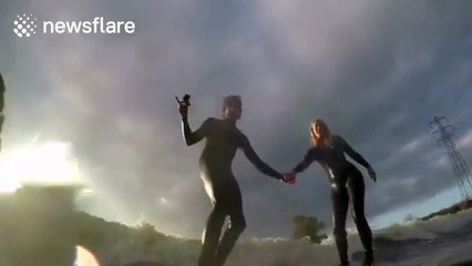 Surfer proposes to girlfriend while riding the famous Severn Bore