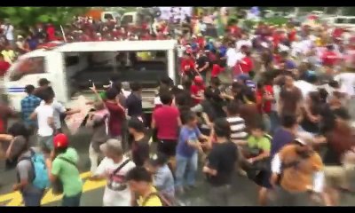 Police Van rams protesters outside US Embassy Manila