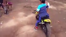 whatsapp  funny videos 2016 || small kid showing stunts on his bike